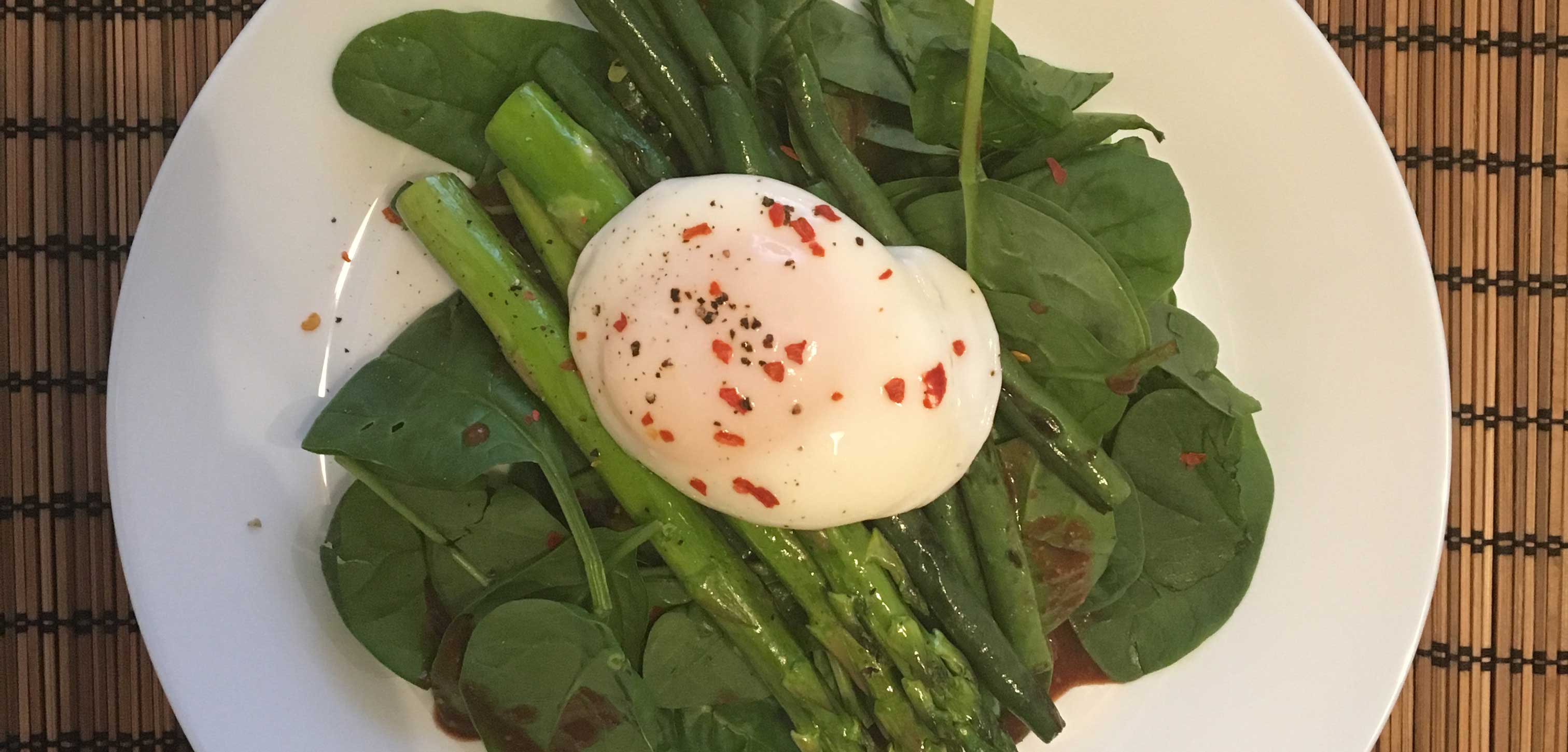 Poached Egg over spinach & asparagus